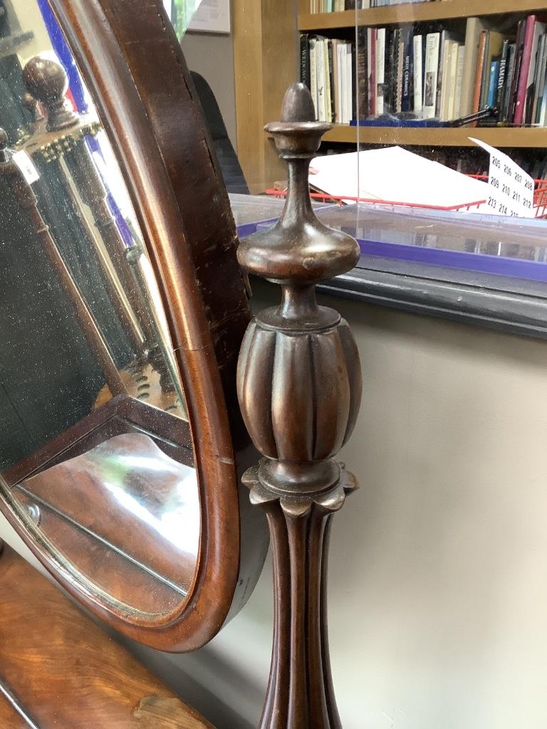A Victorian mahogany toilet mirror, with hinged box base, width 72cm height 86cm
